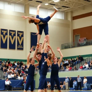 Newberry College Acrobatics and Tumbling team performing a pyramid formation during their debut match.