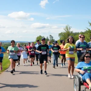 Community members participating in a brain injury awareness event, walking and enjoying the outdoors.